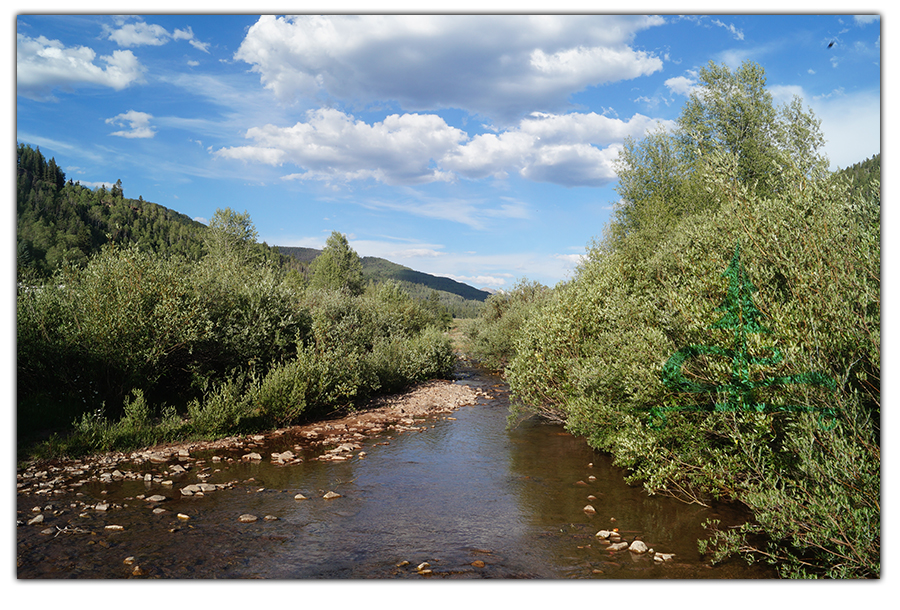 walking in the stream while camping near purgatory