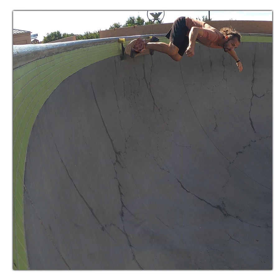 longboarding the steep bowl at the pueblo skatepark